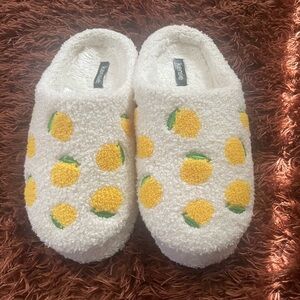 White slippers with lemons